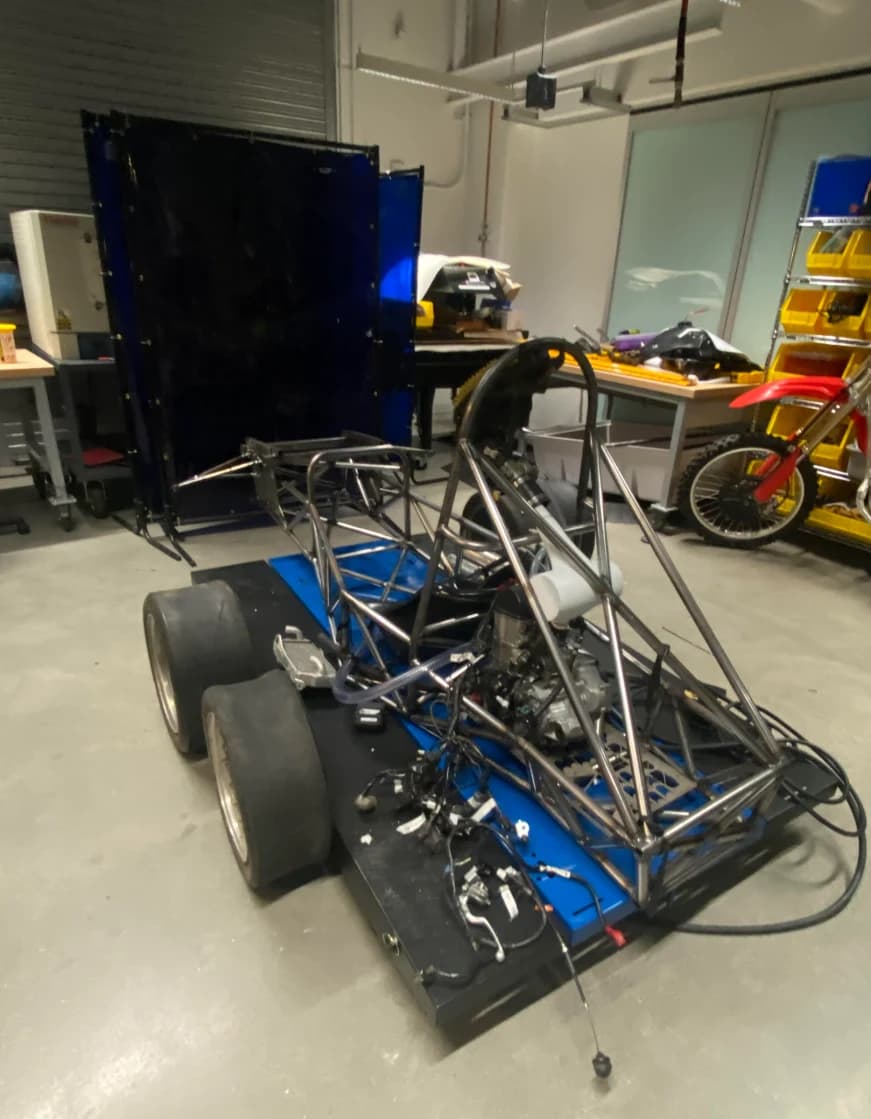 Harvard Formula SAE team vehicle in the workshop